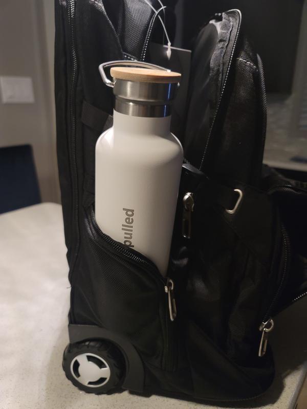 Small compartment.  Cannot hold an umbrella.