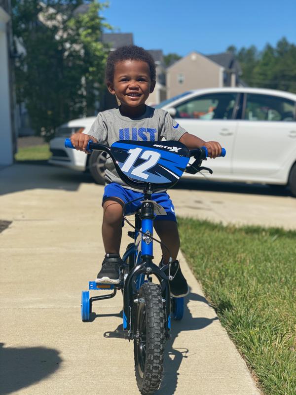 child on bike