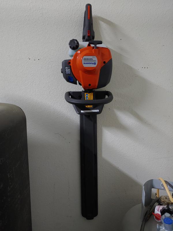 Easy to store! Doesn't sit on the garage floor like the weed eater