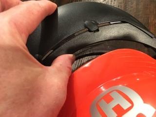 Raised part on left has tab on the bottom side that lines up with slot BUT large one inch tab in the middle prevents shade from slide into place