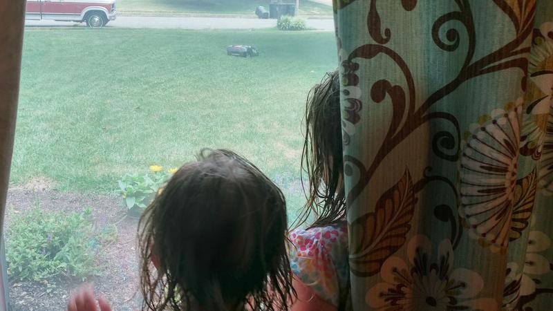 Spending time with kids while the mower does the work!