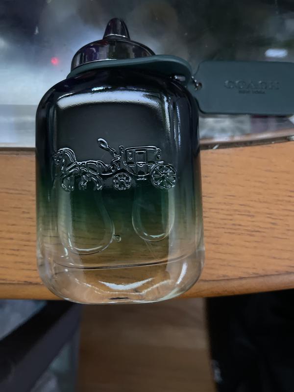 Pretty cool bottle with famous leather coach tag