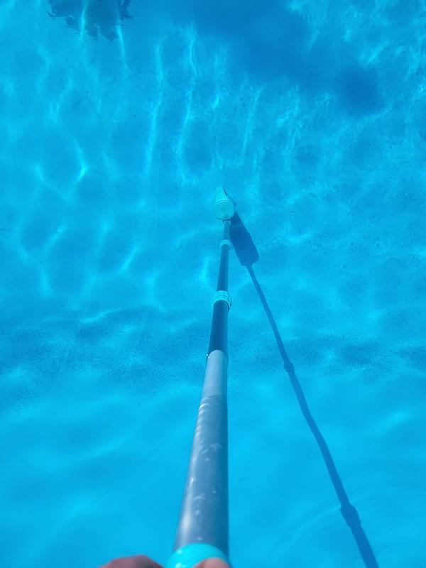 Reaches to the bottom of the inground pool.