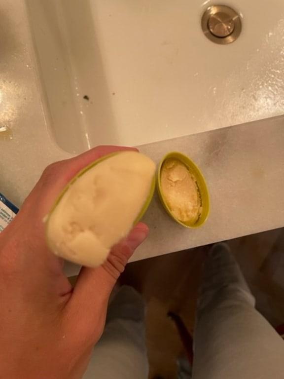 Hardened product that would not come through the top.