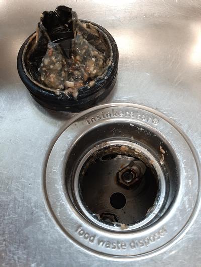 Remove rubber stopper to clean, or retrieve something that fell into the unit.