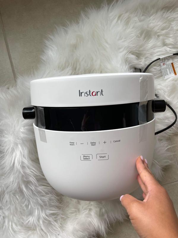 Is there a user manual provided with Instant 20-Cup Rice Cooker?