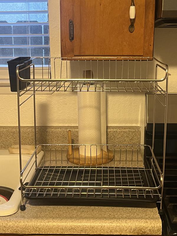 Bottom tray with adjustable sprout that drains water into sink