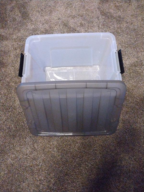 Empty with lid off and plastic side locks showing.