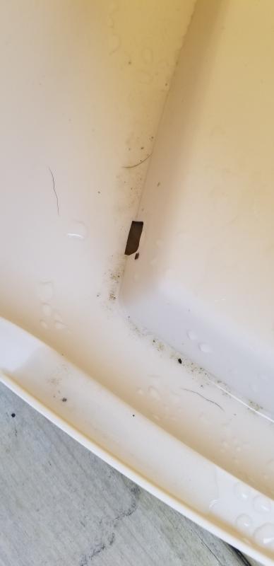 Drainage holes in the lowered interior perimeter help to prevent pooling water.