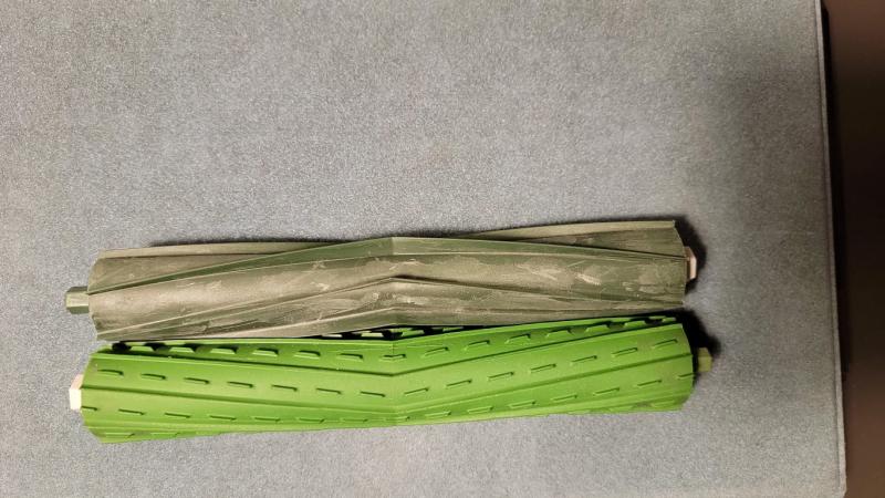 One on the bottom is the original. New roller is 1/8 inch to short.