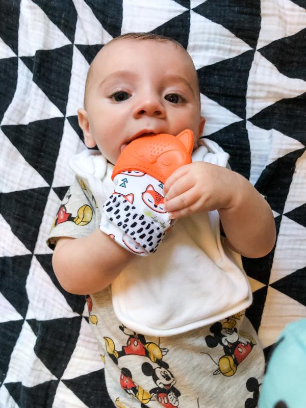 Little guy loves his Itzy Mitt!