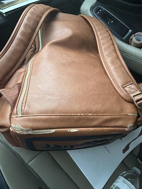 Customer photo for "Durable and spacious, but tacky changing pad"