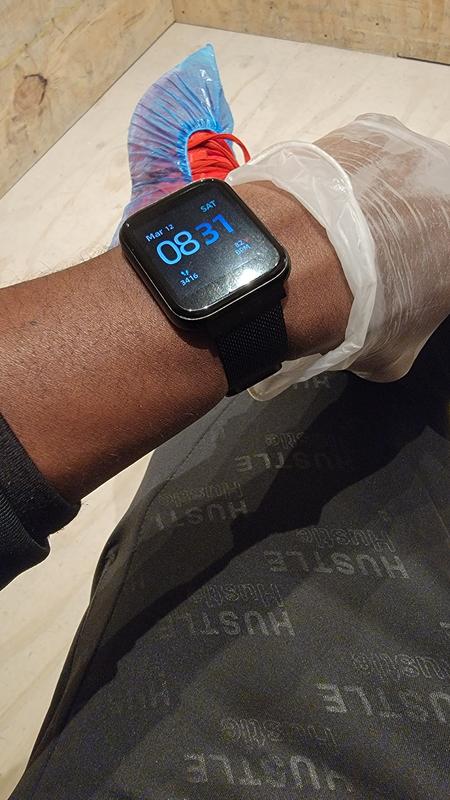 Looking at the time while at work.