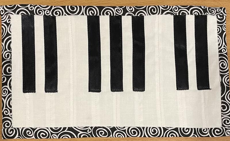 White Swirls on Black Quilt Cotton Fabric by Quilter's Showcase