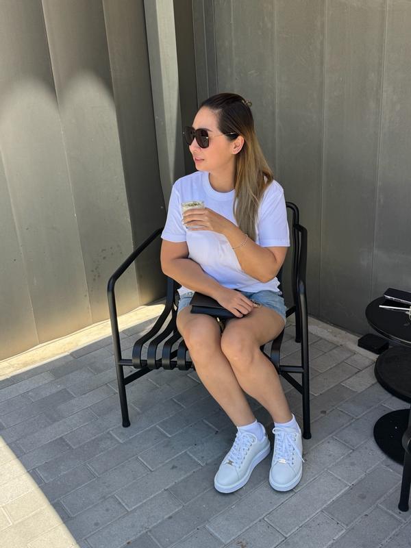 Customer photo for "Comfortable, flattering, and versatile-this is the perfect everyday white tee!"