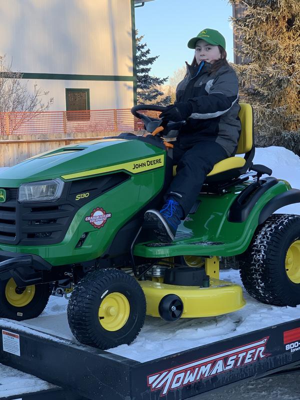 How much does a discount john deere lawn tractor weigh