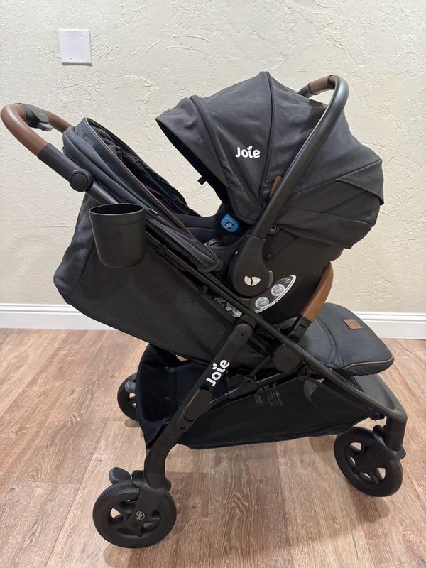 Poppy™ Whirl + Mint Latch Travel System with 360⁰ Spinning Wheels