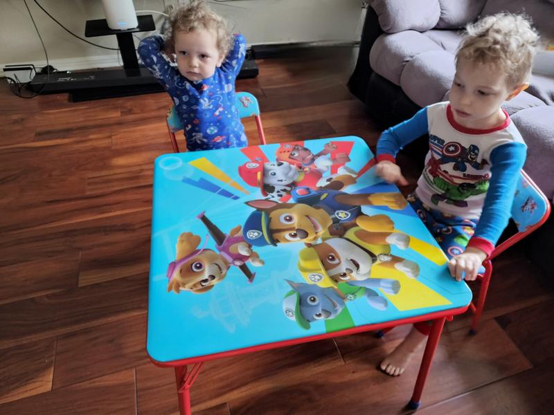 Youngest and middle son ready for breakfast at their new table