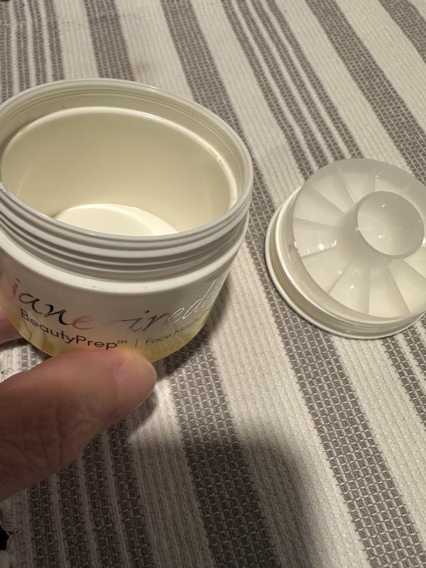 Customer photo for "Only the cap has a cream, jar is empty"