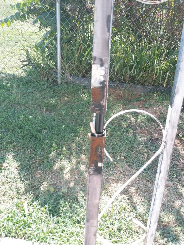 Broken column with a curtain rod inserted for support