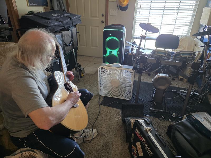 In my buddy's practice space..hopefully I'm able to upload a video of him plugged in with his electric rig...