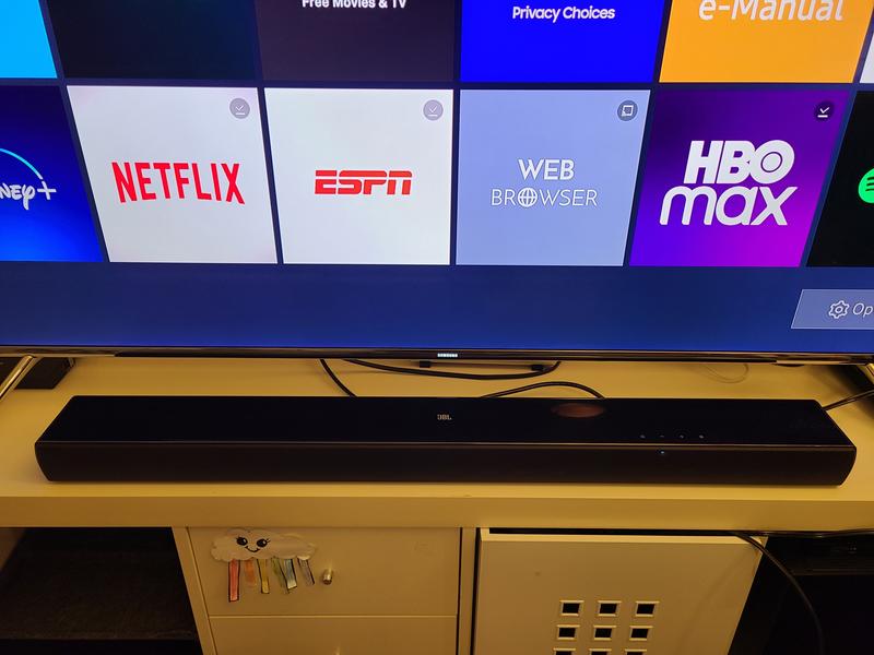 In front of a 65" TV