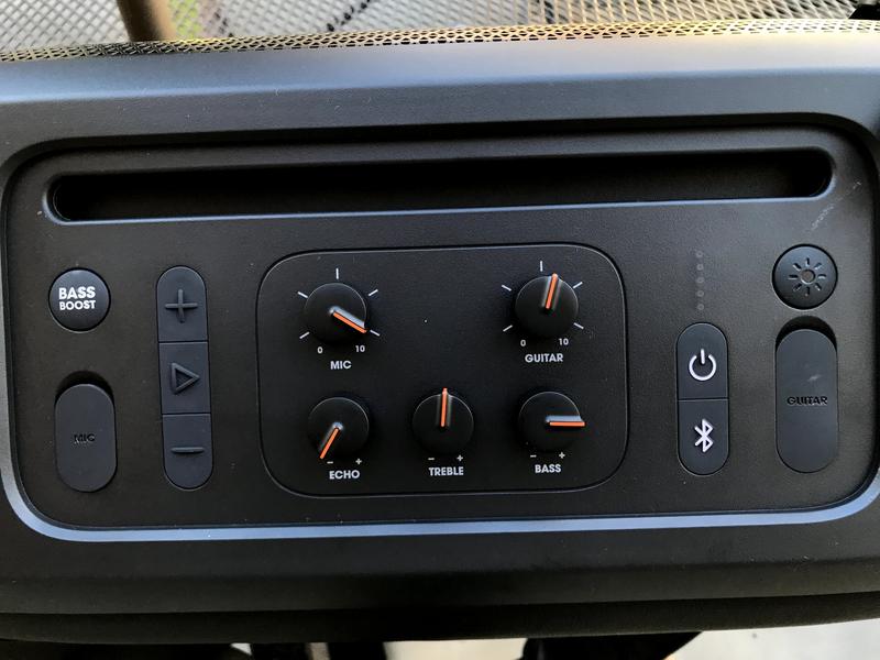 Top view of speaker showing knobs and adjustment options.