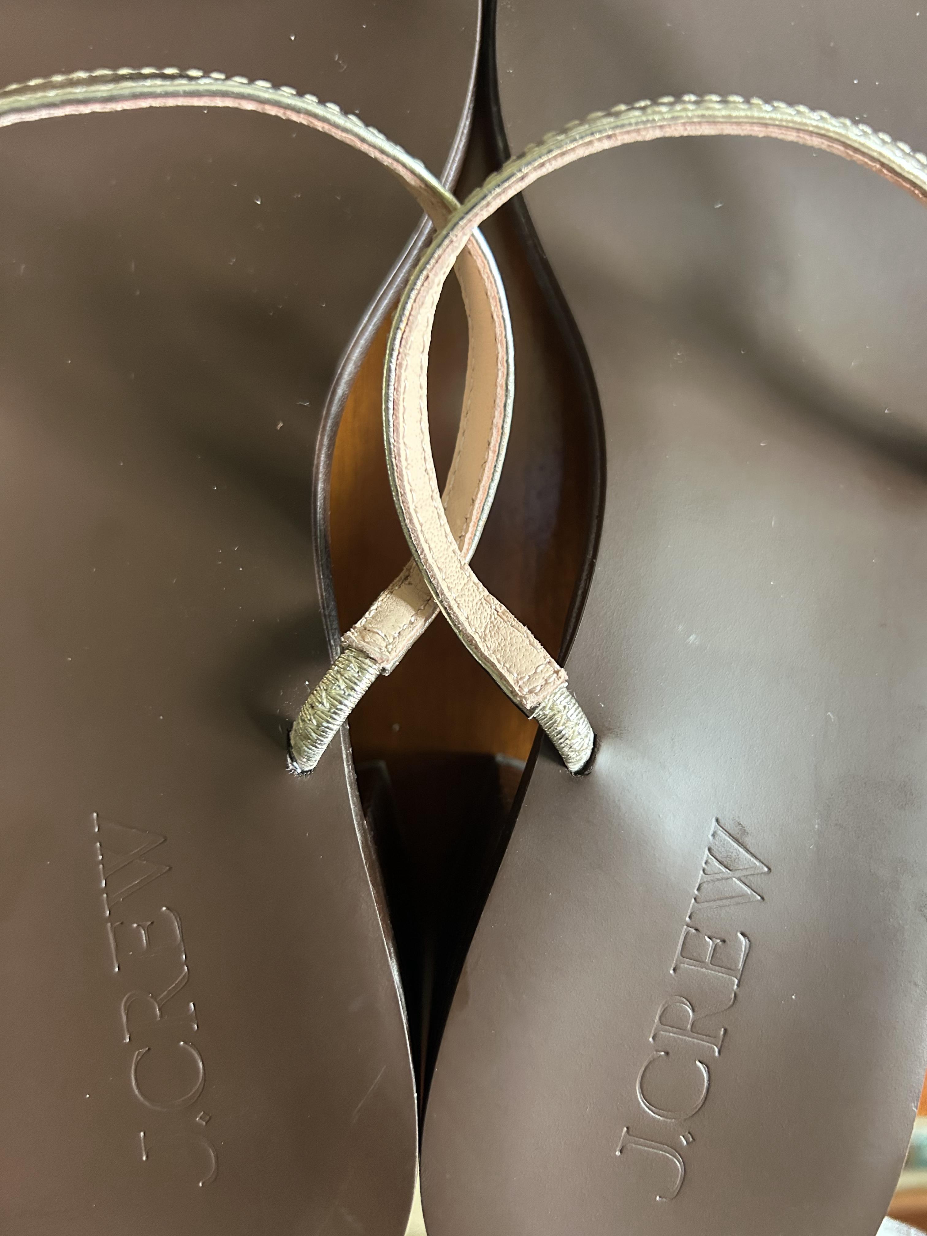 Straps have different length elastic; left sandal slides around on foot