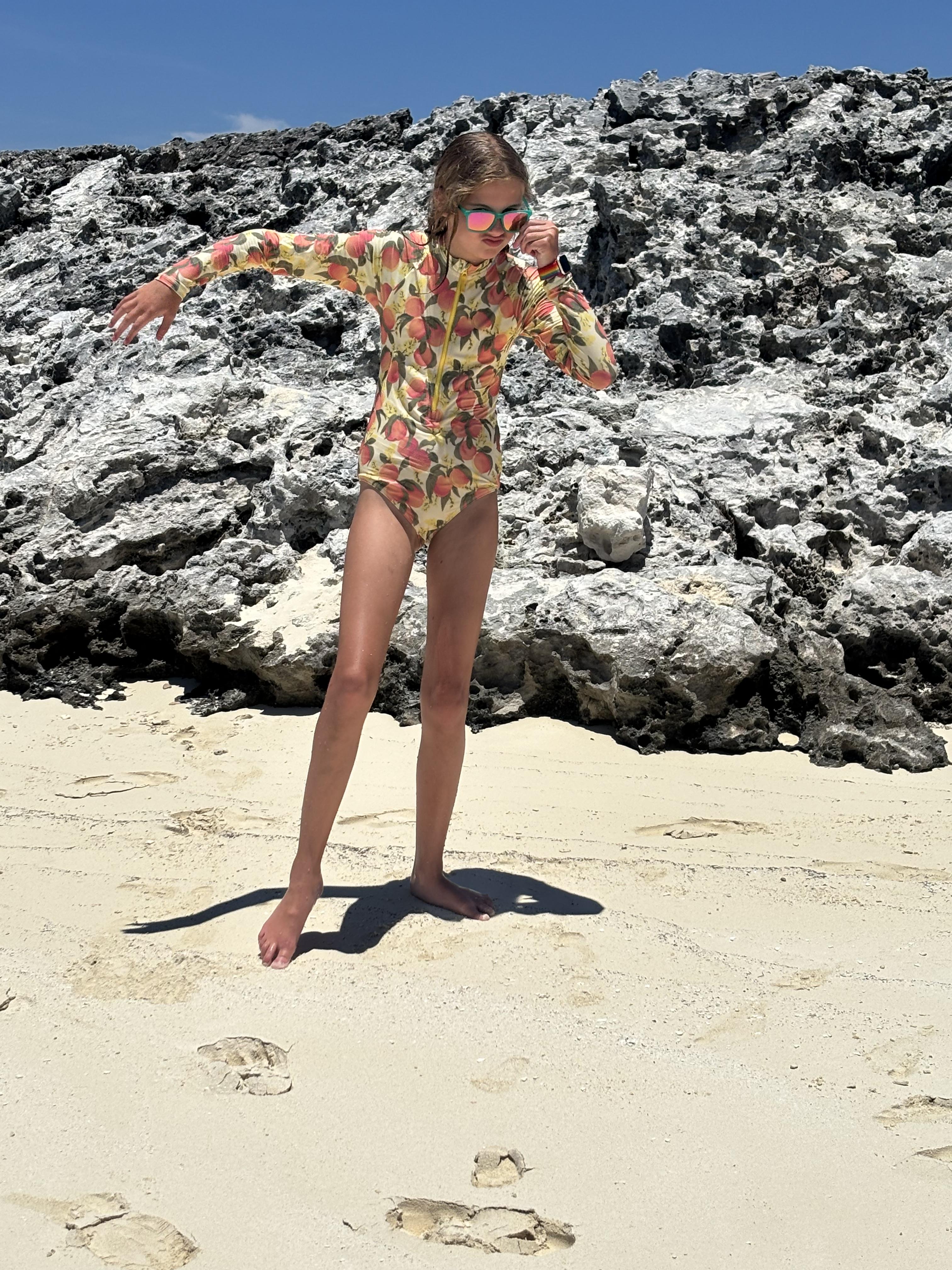 Girls' zip-up rash guard one-piece with UPF 50+ fabric