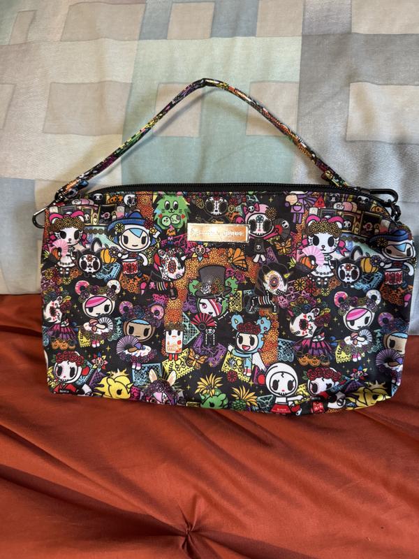 Customer photo for "Lovely print and super versatile small bag!"