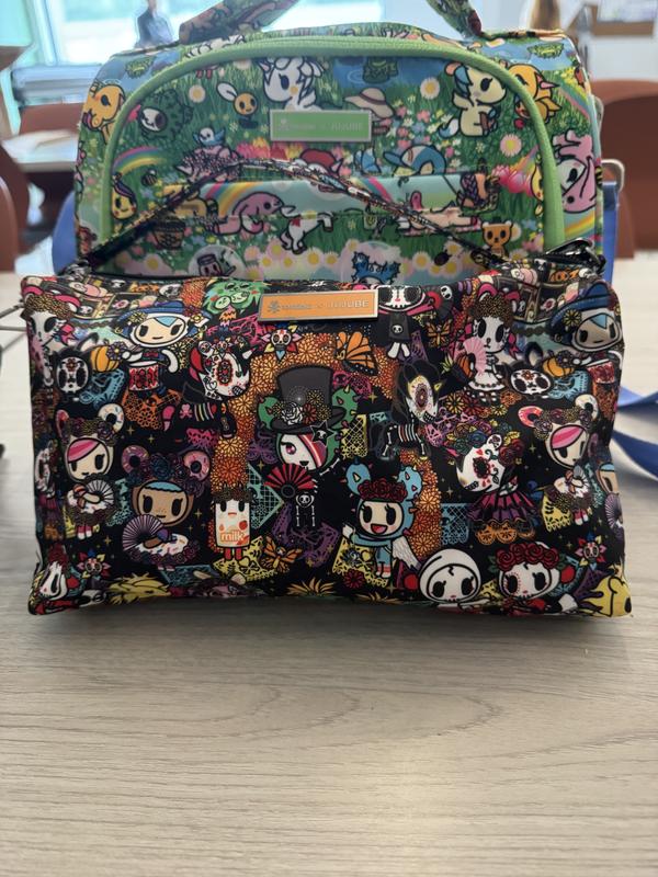 Customer photo for "Lovely print and super versatile small bag!"