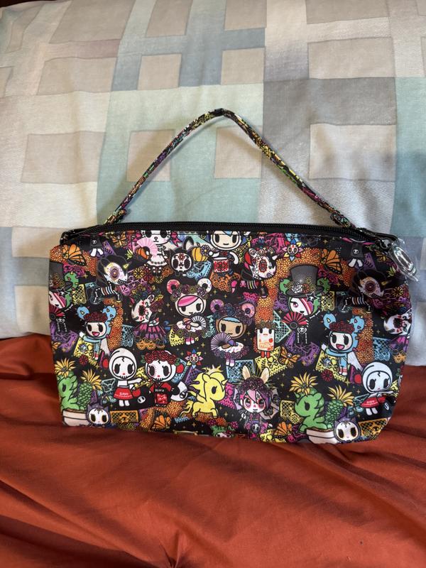 Customer photo for "Lovely print and super versatile small bag!"