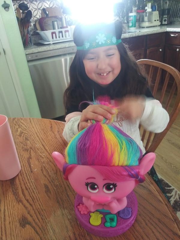 My girl loves her new poppy styling head!