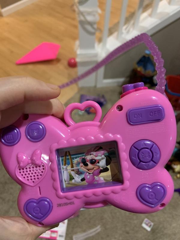 Minnie camera with photo inside. It pops out with button