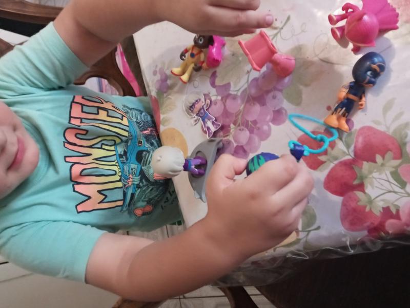 My son playing with the toys