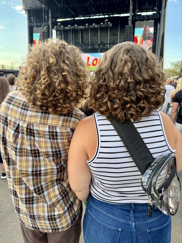 My friend and I, about 8 hours after using the product. My hair is frizzier because I play with it more lol, but hers stayed incredible.