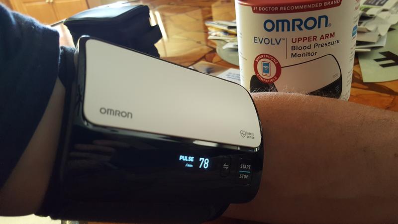 PARIS, FRANCE - OCT 30, 2018: Man holding new Omron Evolv Bluetooth  Wireless Upper Arm Blood Pressure Monitor against white background Stock  Photo - Alamy