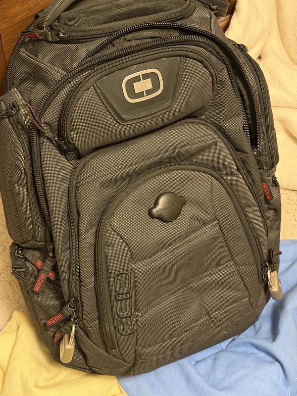 This after about 150,000 airline mile! Added the Apple Tag that poke through and screws in to itself. However, for years I just hid it in the cool zipper pocket on the shoulder strap.