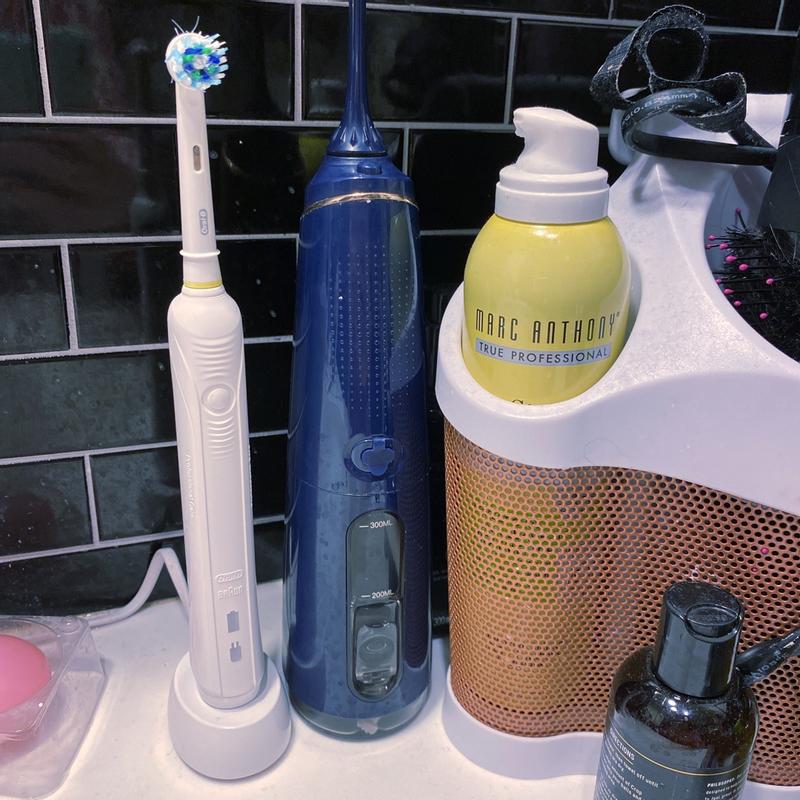 pro 1000 electric rechargeable toothbrush