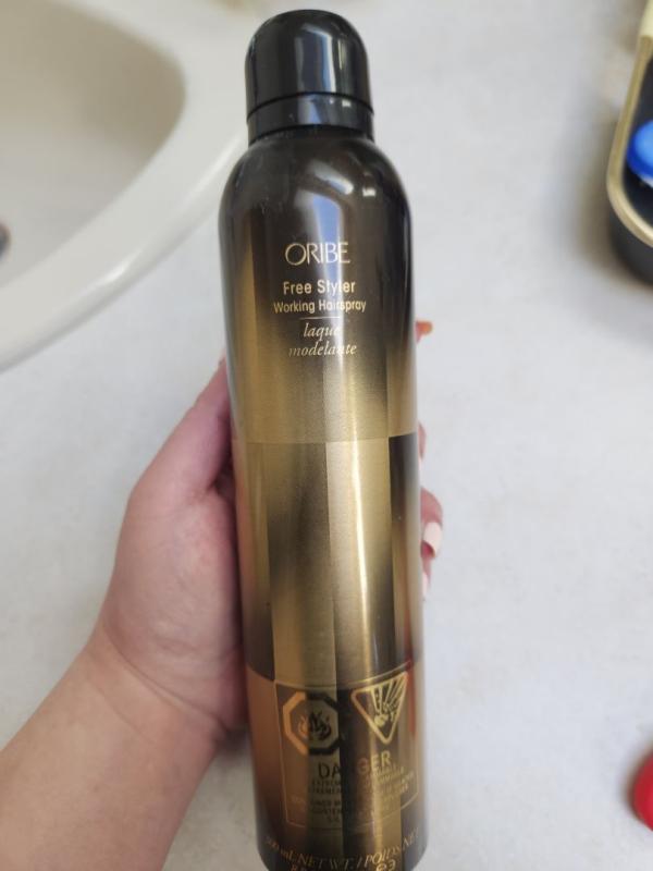 Customer photo for "Good hold hairspray. That doesn't harden"