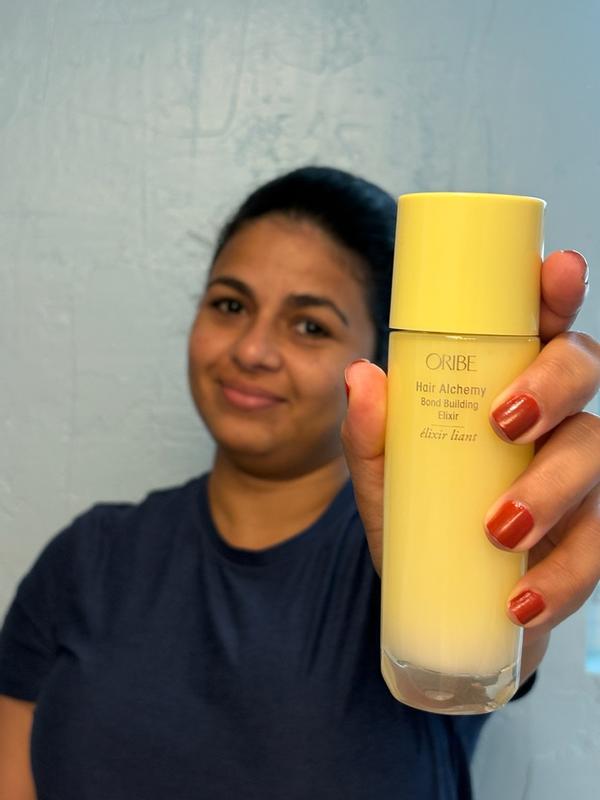 Customer photo for "Luxurious serum that strengthen and smooth hair effortlessly"