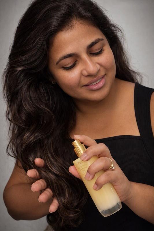 Customer photo for "Luxurious serum that strengthen and smooth hair effortlessly"
