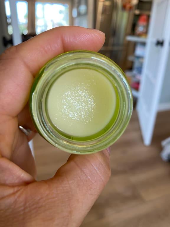 Grainy-ness goes away after warming it up on your lips.