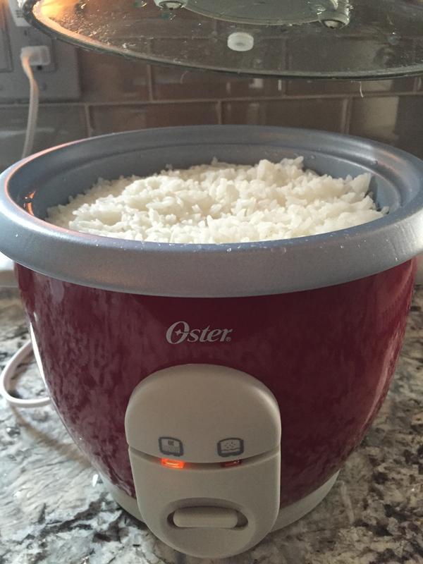  Oster 6-Cup Rice Cooker with Steamer, Red (004722-000-000):  Home & Kitchen