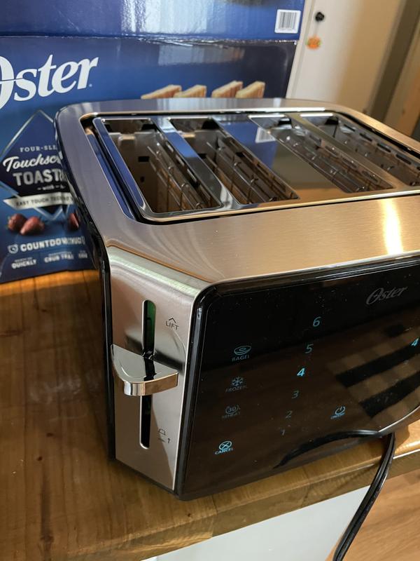 Oster 4-Slice Extra Wide Slot Pop Up Toaster with 9 Shade Settings,  Removable Crumb Tray, and Quick Check Lever, Teal w/ Chrome Accents 