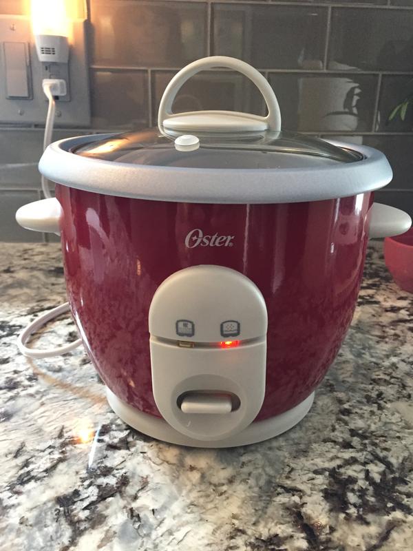  Oster 6-Cup Rice Cooker with Steamer, Red (004722-000-000):  Home & Kitchen