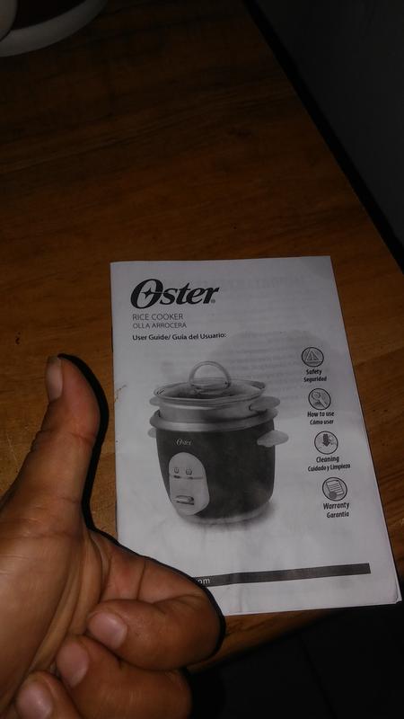 Oster 6-Cup Rice Cooker with Steamer Red (004722-000-000)