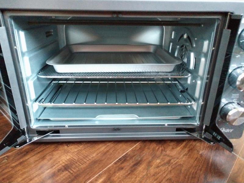 OSTER FRENCH DOOR AIR FRY OVEN IN BOX - Earl's Auction Company