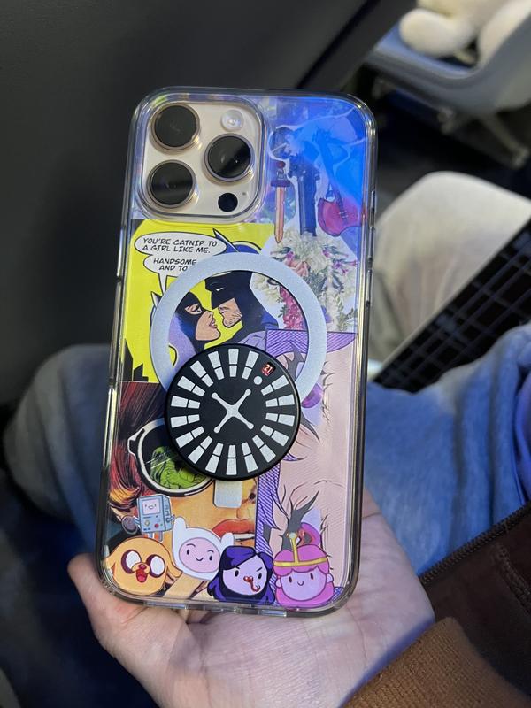 My clear case with my stickers on my phone. There’s also a pop socket on the back
