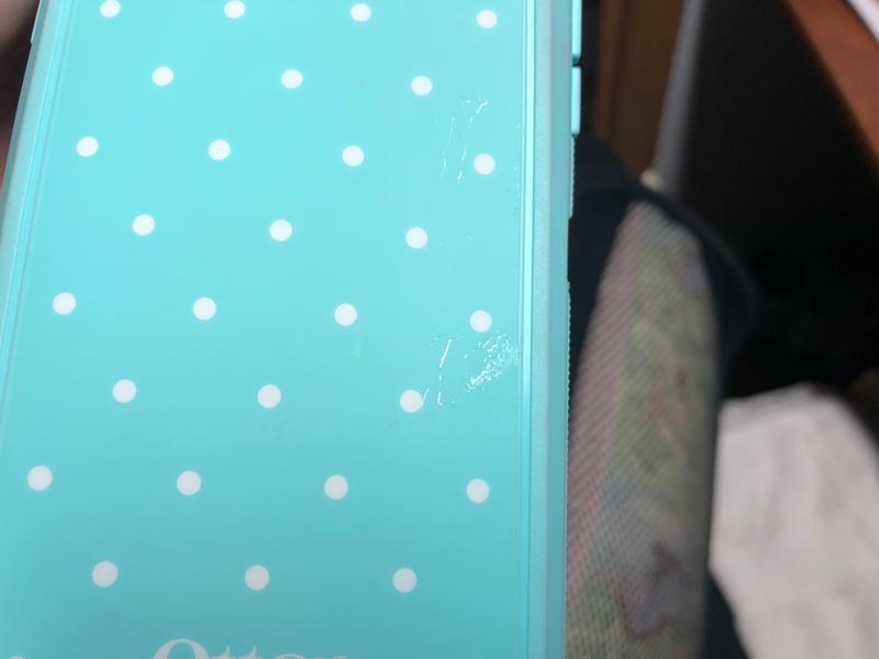 Shiny area. It doesn’t come off; they’re scratches in the finish.